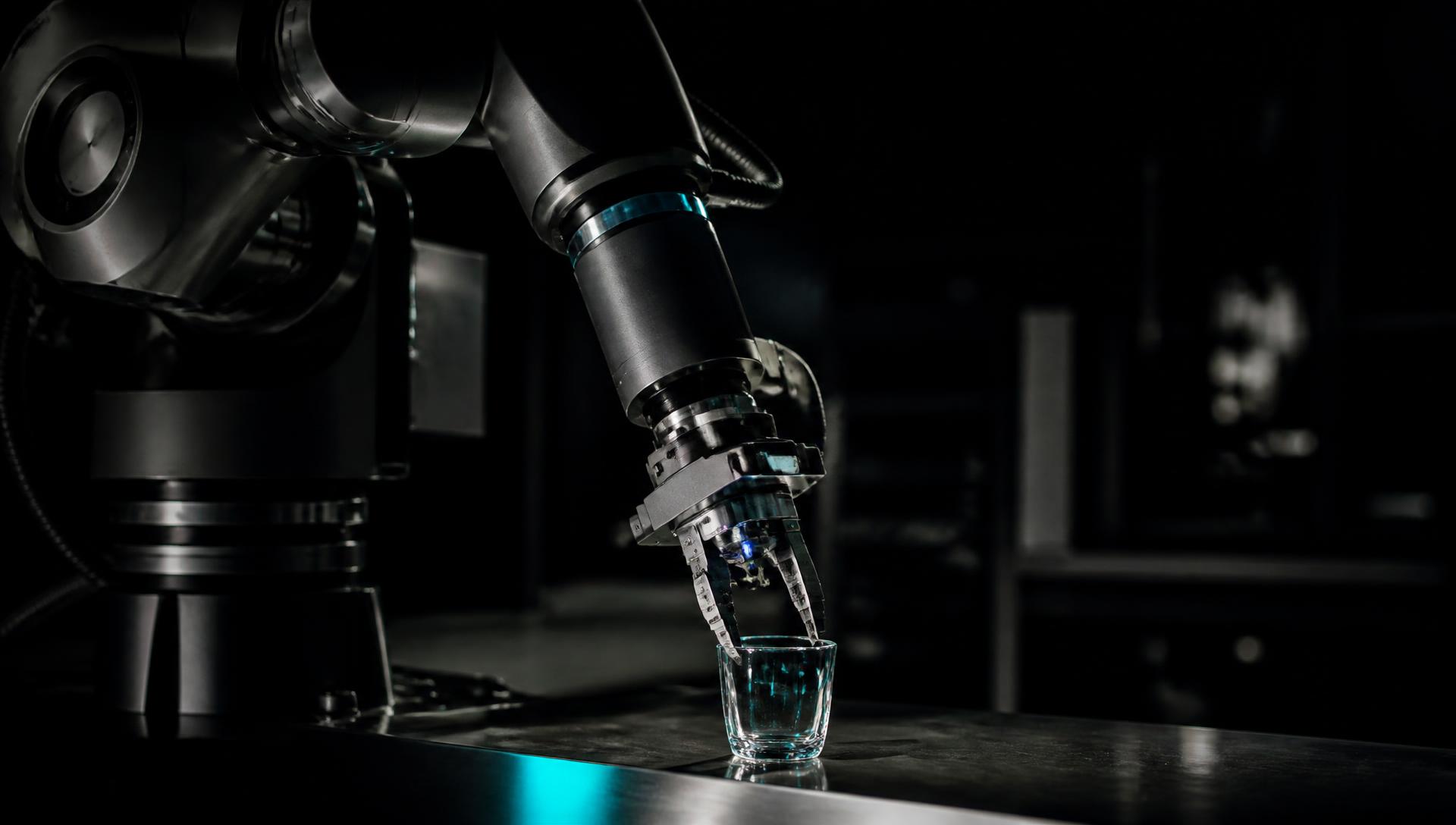 Industrial robotic arm in a dark laboratory, chrome and steel under directional light